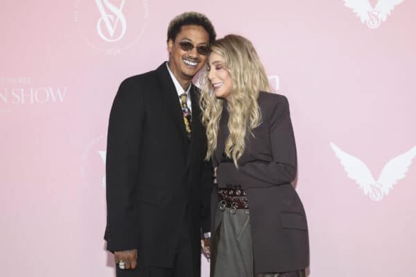 Alexander Edwards, left, and Cher arrive at the Victoria's Secret Fashion Show on Tuesday, Oct. 15, 2024, in the Brooklyn borough of New York. (Photo by Andy Kropa/Invision/AP)