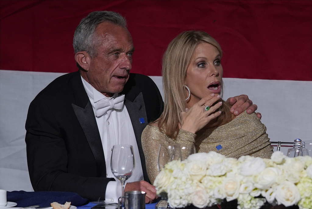 Robert F. Kennedy Jr., and his wife Cheryl Hines attend the 79th annual Alfred E. Smith Memorial Foundation Dinner, Thursday, Oct. 17, 2024, in New York. (AP Photo/Julia Demaree Nikhinson)