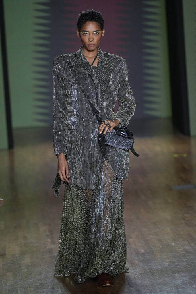 A model wears a creation from the Apartamento 03 collection during the Sao Paulo Fashion Week in Sao Paulo, Friday, Oct. 18, 2024. (AP Photo/Andre Penner)