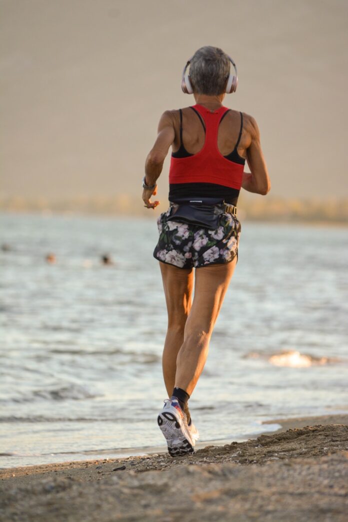 menopause, woman walking on a beach