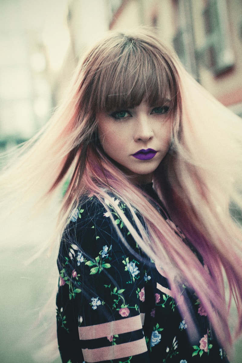 woman taking selfie, having bangs