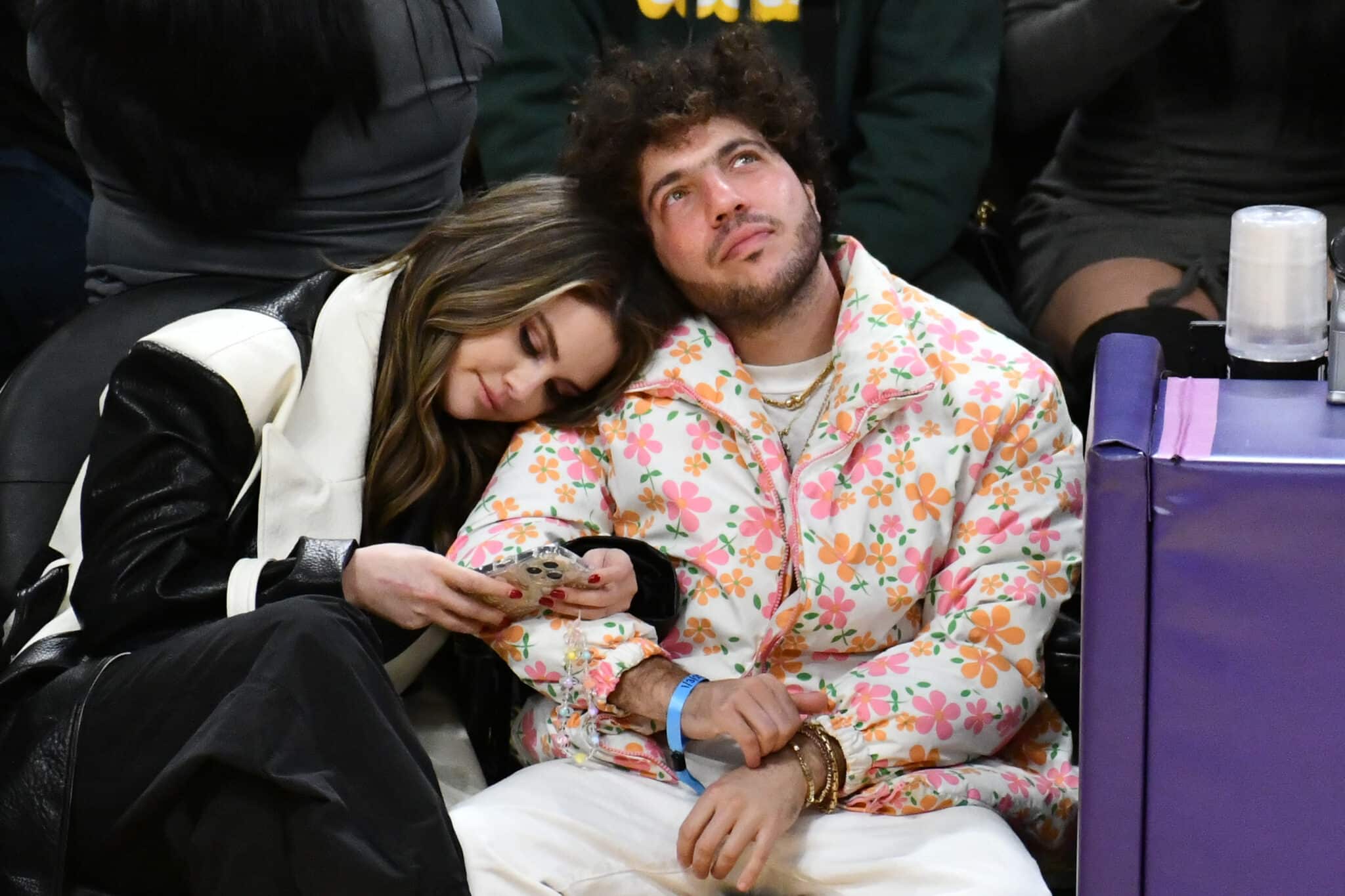Selena Gomez Engaged! Benny Blanco Pops the Question! LOS ANGELES, CALIFORNIA - JANUARY 03: Selena Gomez and Benny Blanco attend a basketball game between the Los Angeles Lakers and the Miami Heat at Crypto.com Arena on January 03, 2024 in Los Angeles, California. NOTE TO USER: User expressly acknowledges and agrees that, by downloading and or using this photograph, User is consenting to the terms and conditions of the Getty Images License Agreement. (Photo by Allen Berezovsky/Getty Images)