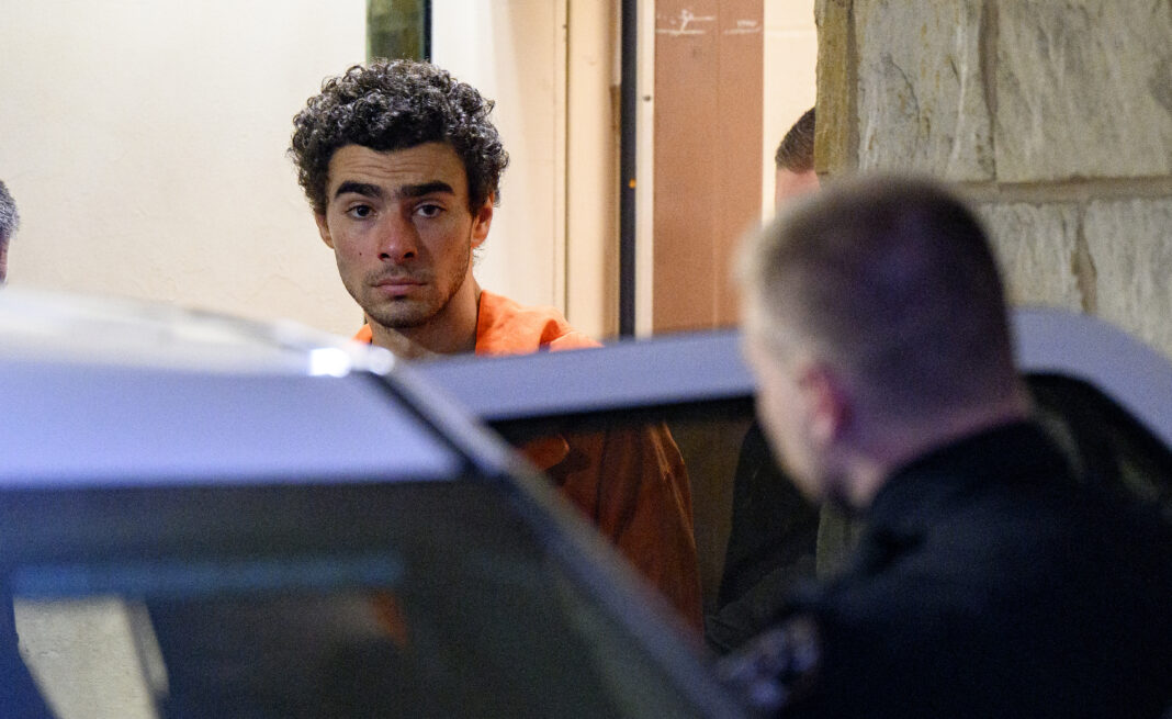 HOLLIDAYSBURG, PENNSYLVANIA - DECEMBER 10: Suspected shooter Luigi Mangione is led from the Blair County Courthouse after an extradition hearing December 10, 2024 in Hollidaysburg, Pennsylvania. Mangione has been arraigned on weapons and false identification charges related to the fatal shooting of United Healthcare CEO Brian Thompson in New York City. Mangione is incarcerated in the State Correctional Institution in Huntingdon, Pennsylvania awaiting extradition to New York. (Photo by Jeff Swensen/Getty Images)