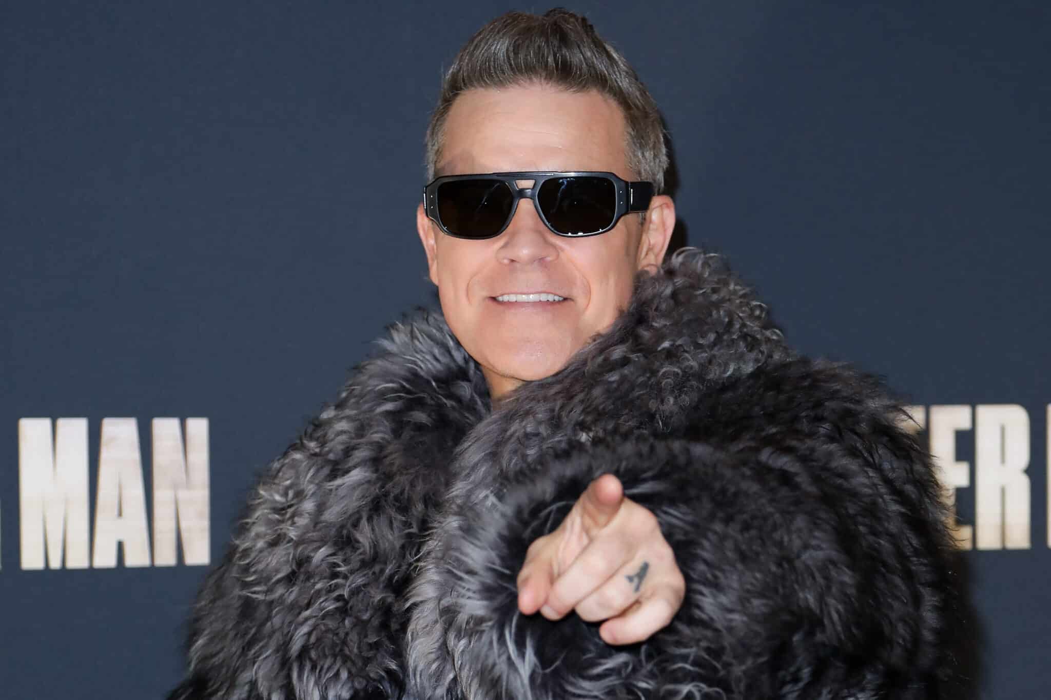 Robbie Williams attends the "Better Man" Paris Premiere at the Le Grand Rex on December 13, 2024 in Paris, France. (Photo by Antoine Flament/Getty Images)