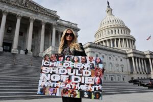WASHINGTON, DC - DECEMBER 17: Celebrity hotel heiress Paris Hilton poses for photographs outside the U.S. Capitol on the day the House of Representatives is set to vote on The Stop Institutional Child Abuse Act on December 17, 2024 in Washington, DC. Citing her own traumatizing experience at Provo Canyon School in Utah when she was a teenager, Hilton has lobbied for three years for the legislations that would place greater federal safeguards on institutional youth treatment programs. (Photo by Chip Somodevilla/Getty Images)