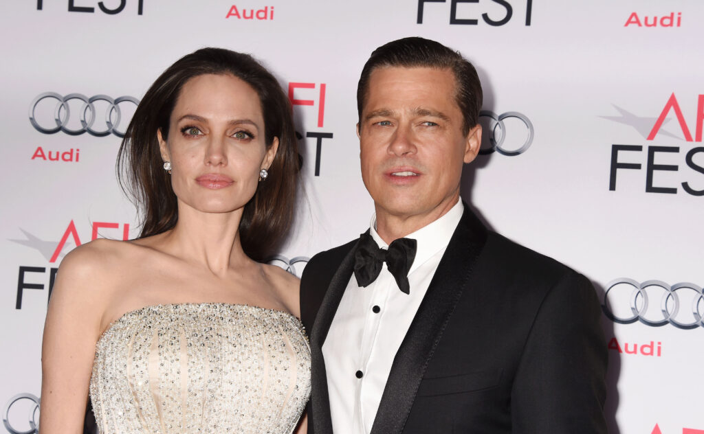 HOLLYWOOD, CA - NOVEMBER 05: Writer-director-producer-actress Angelina Jolie Pitt (L) and actor-producer Brad Pitt arrive at the AFI FEST 2015 presented by Audi Opening Night Gala Premiere of Universal Pictures' 'By The Sea' at TCL Chinese 6 Theatres on November 5, 2015 in Hollywood, California.(Photo by Jeffrey Mayer/WireImage)