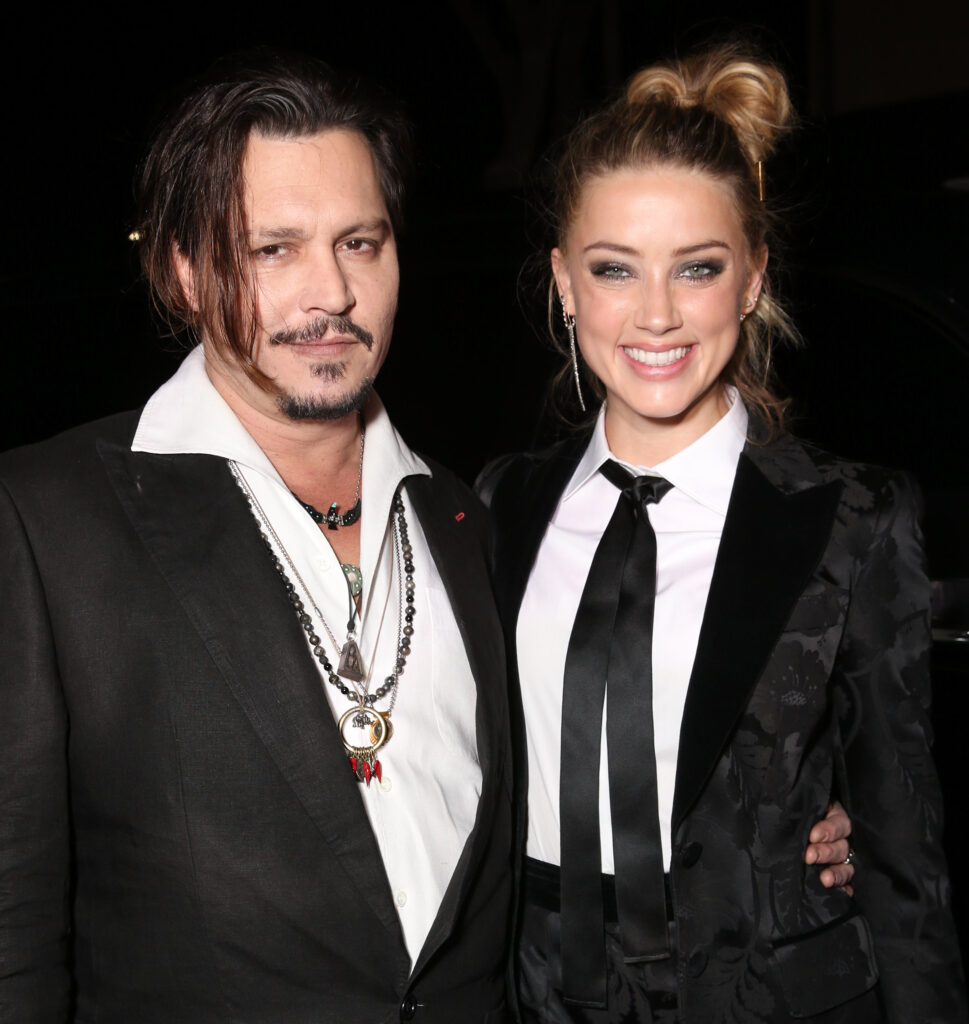 WESTWOOD, CA - NOVEMBER 21: Johnny Depp and Amber Heard attend the premiere Of Focus Features' "The Danish Girl" on November 21, 2015 in Westwood, California. (Photo by Todd Williamson/Getty Images)