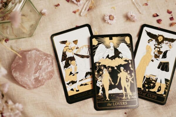 4 Zodiac Signs Never Beg for Love - horoscope, astrology, zodiac signs, icons, cutout, horoscope, horoscope, astrology, astrology, astrology, zodiac signs, zodiac signs, zodiac signs, zodiac signs, zodiac signs - Stylish tarot cards with a rose quartz crystal on a textured background, ideal for divination themes.