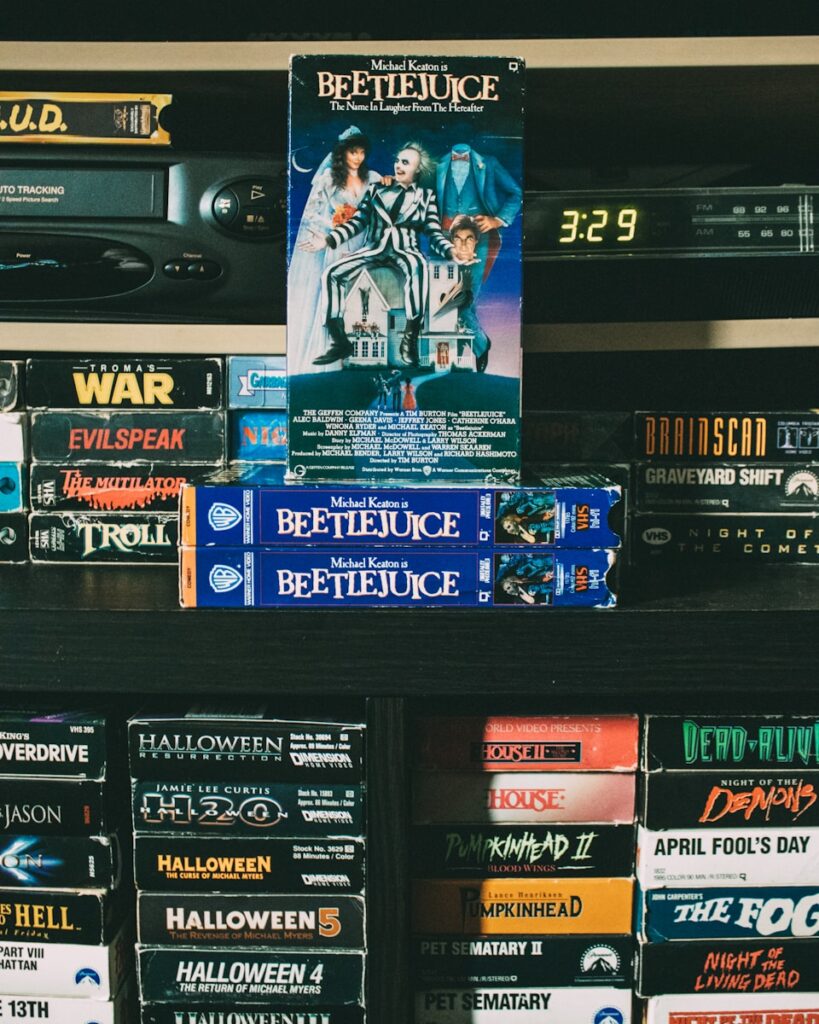 beetlejuice. a bunch of dvd's on a shelf in a store