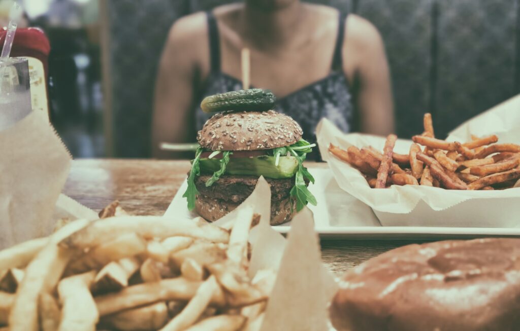 binge eating, burger beside potato fries