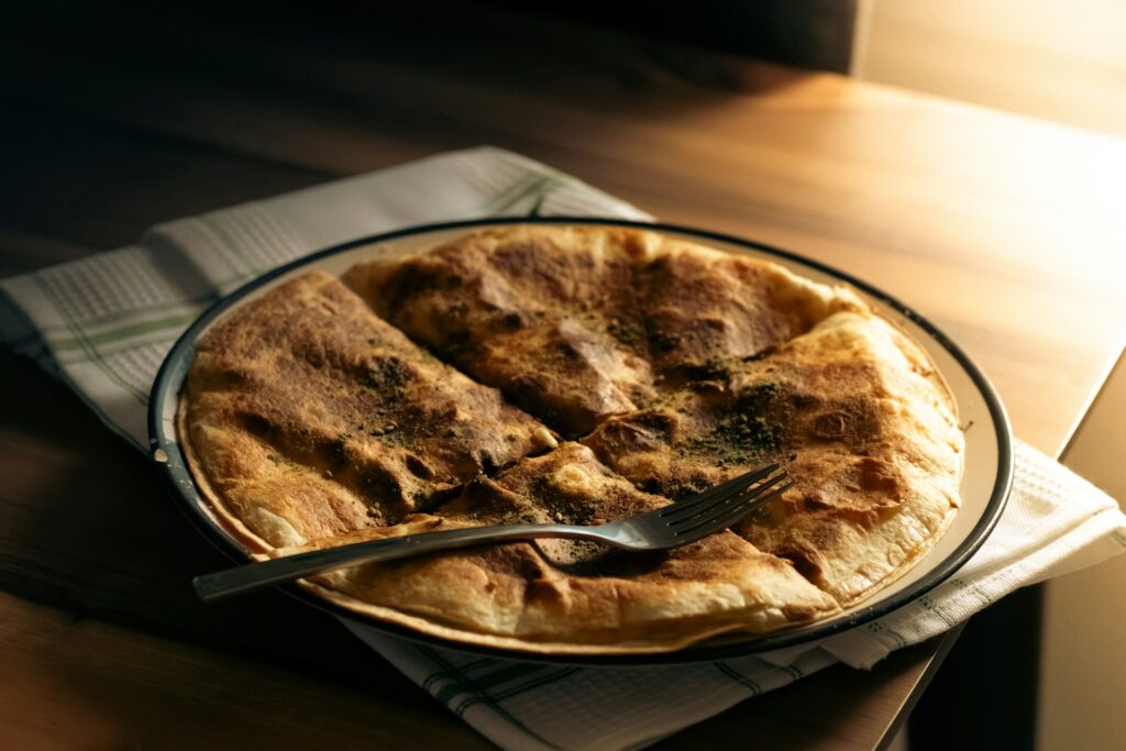 a plate of food on a table with a fork
