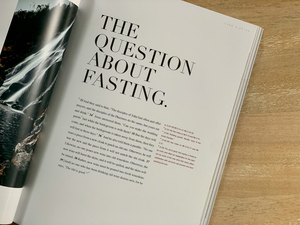 fasting, an open book with a picture of a waterfall