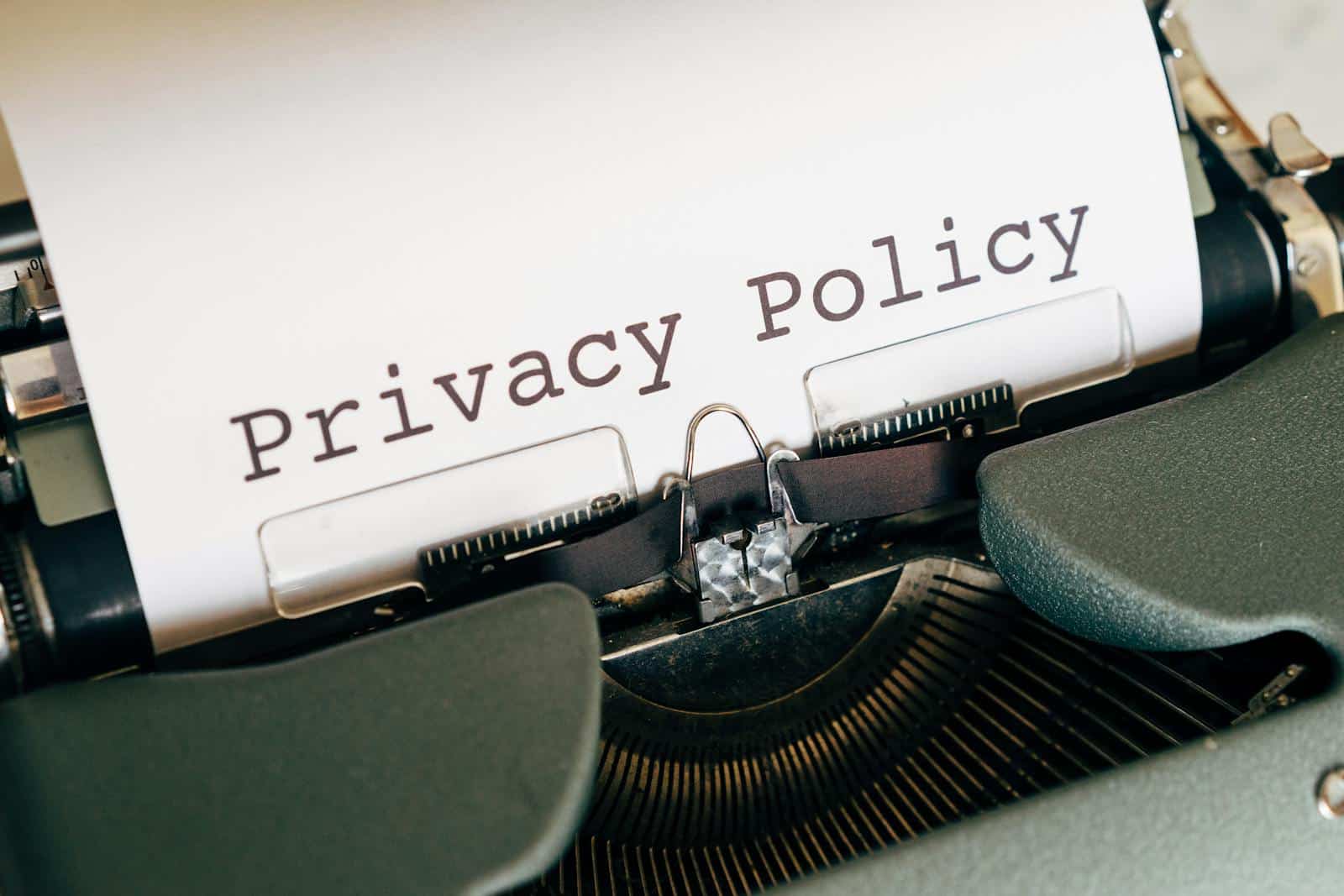 Privacy Policy - A vintage typewriter writing 'Privacy Policy' on paper, capturing an old-school conceptual theme.