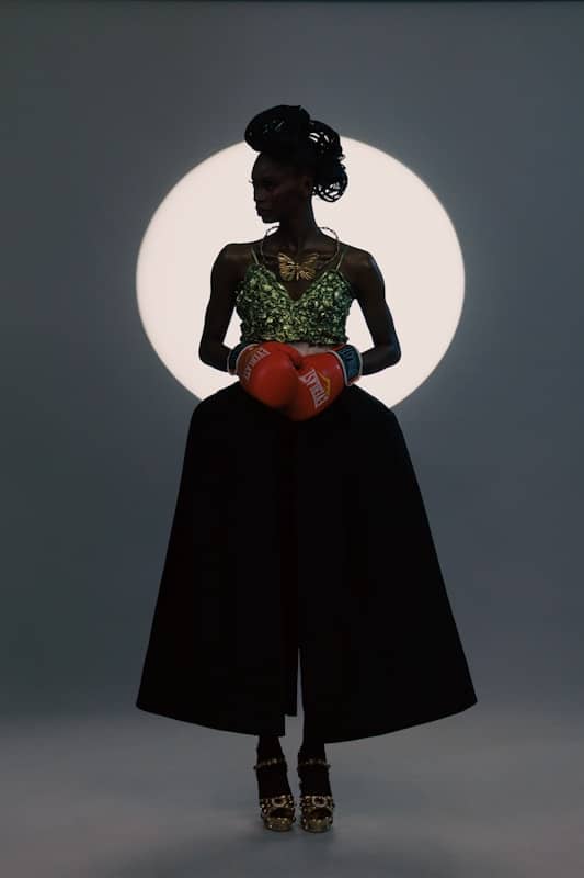 Editorial Standards & Ethics - A woman standing in front of a full moon