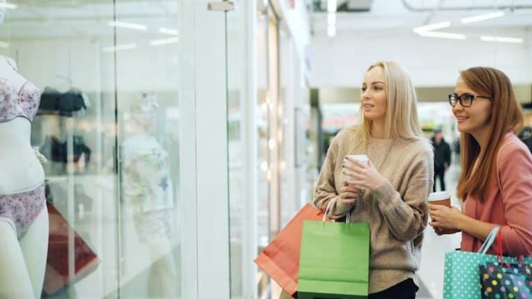 Shop Smarter: The New Consumer Revolution Is Here - Two women looking at a store window display.