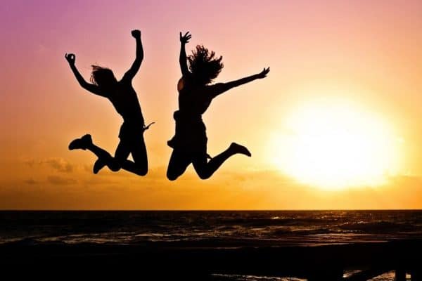 joy new year background, sunset, beach, silhouettes, jump, jumping, nature, youth, active, happy, pair, girls, young women, people, joy, freedom, seaside, dusk