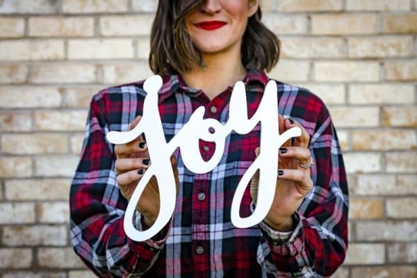 Joy Unlocked : Your Best Life is Closer Than You Thinkwoman holding joy text