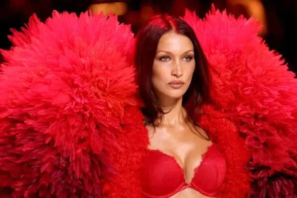 Bella Hadid: From Cannes red carpet to blue swimsuit joy.